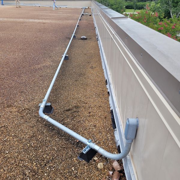 Rooftop conduit and bonding run